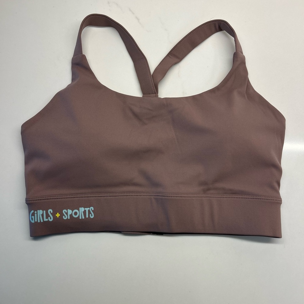 Brand new, never worn. Brown sports bra. Padding. Adjustable back. Size M.